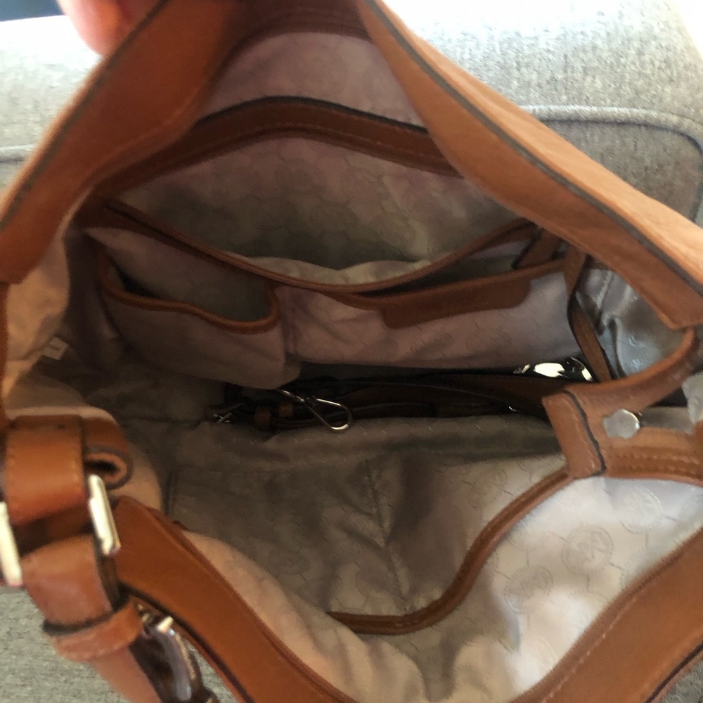 Michael Kors leather shoulder bag with dust bag, never used.  Brand new..